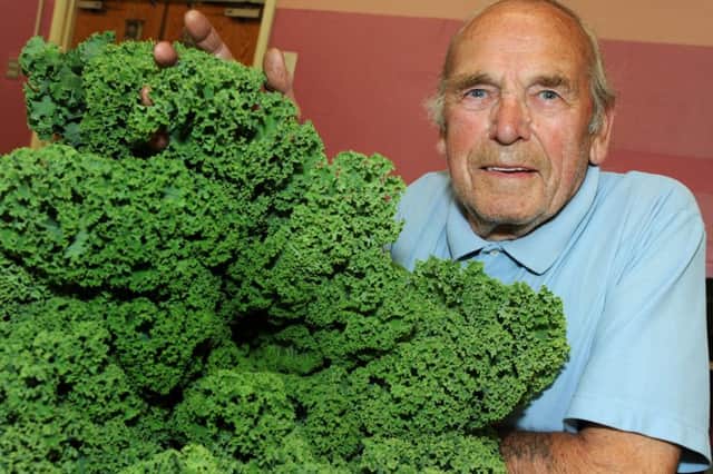 Eddie Brusby with his exhibit of curly kale which he entered in the Brimington flower and vegetable show on Saturday.