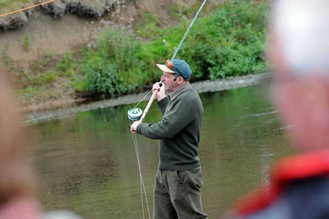Chatsworth Country Fair.          
Visitors are given a masterclass in fly flishing on the river Derwent.