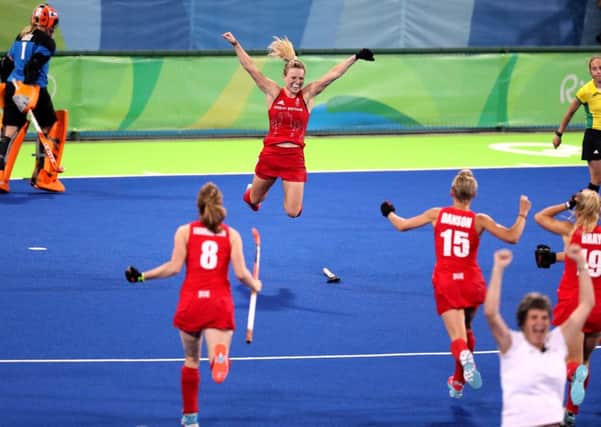 Great Britain's Hollie Webb celebrates scoring the winning goal in the penalty shootout during the gold medal match at the Olympic Hockey Centre on the fourteenth day of the Rio 2016 Olympics. Picture by PA.