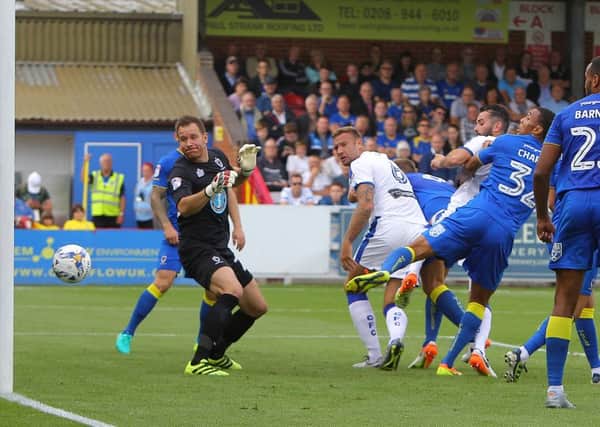 Wimbledon's Darius Charles puts through his own net to give Chesterfield the lead. Picture by Gareth Williams/AHPIX.com. Football, Sky Bet League One; 
AFC Wimbledon v Chesterfield; 03/09/2016 KO 3.00pm;  
The Cherry Red Records Stadium;
copyright picture;Howard Roe/AHPIX.com
