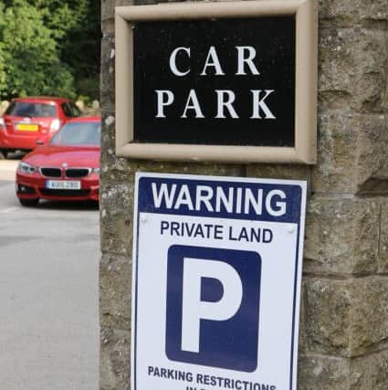 Parking signs Devonshire Arms Baslow