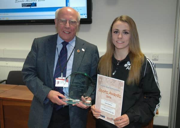 BOXING CLEVER -- Jade Ashmore receives her award from Coun Graham Baxter.