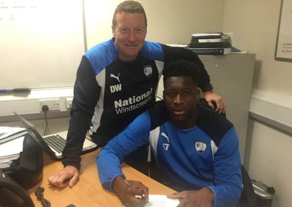 Ricardo German signs his first pro contract at Chesterfied FC with manager Danny Wilson