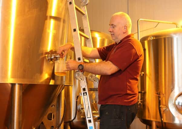 Gareth hard at work in the brewhouse.