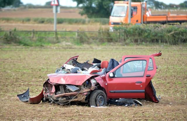 Smashed car in field near Glapwell of the A617.