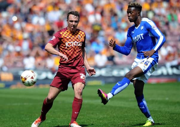 Bradford City v Chesterfield.
Bantams Tony McMahon takes on Chesterfield's Gboly Ariyibi.
8th May 2016.
Picture : Jonathan Gawthorpe