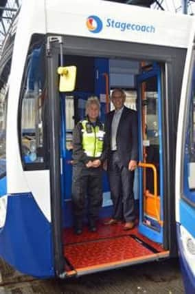 PCSO Becky Damms and  Hardyal Dhindsa, Derbyshires current Police and Crime Commissioner,  aim to make bus journeys safer.
