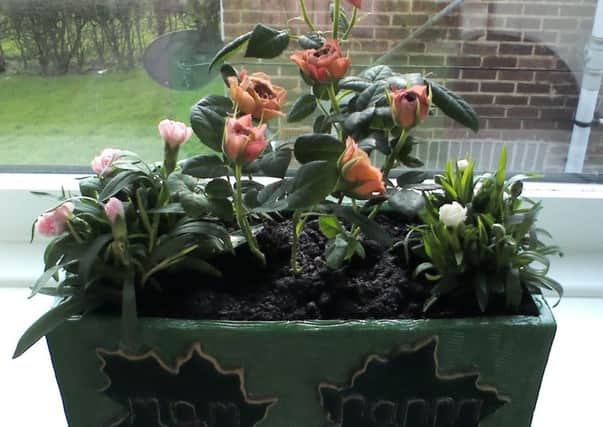 This planter made by Ann Swain was steolen from her mother's grave in Clay Cross.