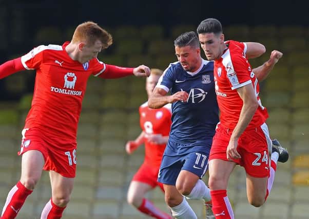 Chesterfield's Conor Wilkinson bursts beyond Southend's Stephen McLaughlin
