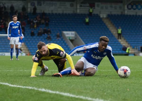 Chesterfield vs Fleetwood Town - Gboly Ariyibi and former spireite Jimmy Ryan battle for the ball - Pic By James Williamson