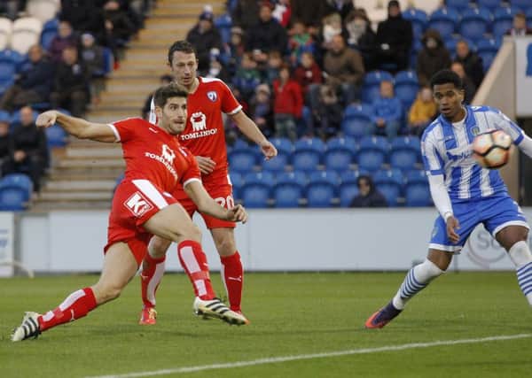 GOOD EVANS! -- striker Ched Evans volleys Chesterfield's winning goal at Colchester United in the FA Cup, First Round. (PHOTO BY: Howard Roe/AHPIX.com)