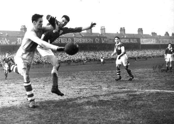 Young Spireites centre-forward Bobby Raine launches into a challenge on the Yeovil keeper that has the appearance of being filed under enthusiastic rather than accurate' in the FA Cup in 1950