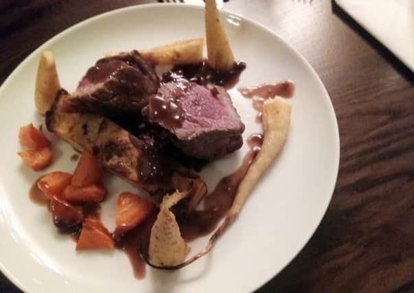 Rump of lamb with dauphinoise potato, braised red cabbage and roast winter vegetables