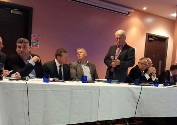 Dave Allen flanked by his fellow directors, CEO Chris Turner and manager Danny Wilson at the Chesterfield AGM, shortly before he resigned