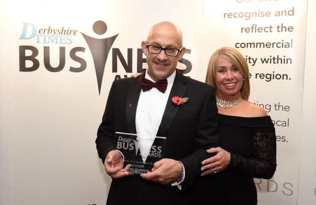 Andy Dukelow with his winners award for Lifetime Achievement at the Derbyshire Times Business Awards 2016. Picture: Andrew Roe