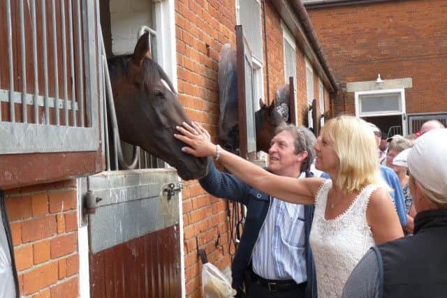 CHRISTMAS GIFT IDEA -- this behind-the-scenes visit to the Newmarket stable of Sir Michael Stoute was just one of the benefits of membership of The Racegoers Club.