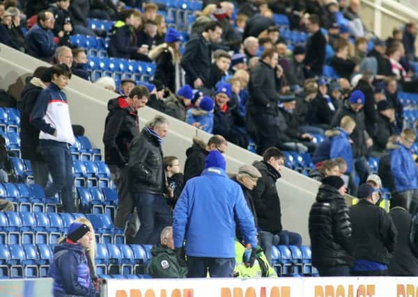Chesterfield v Wycombe Wanderers, the home fans stream out after the fourth goal