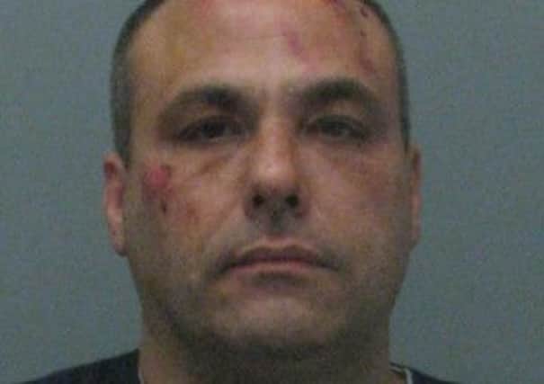 Pictured is Daniel Smith, 48, of Cotmanhay, who is being sought by police to help them with enquiries into an aggravated burglary in Ilkeston.