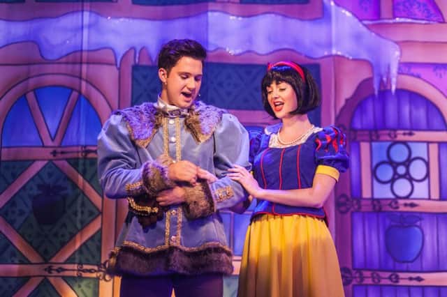 Brad Veitch as Prince Tristan) and Lucy Dixon as Snow White.