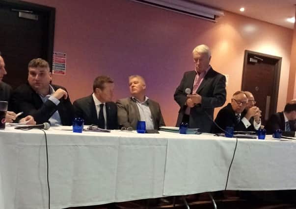 Dave Allen flanked by his fellow directors, CEO Chris Turner and manager Danny Wilson at the Chesterfield AGM, shortly before he resigned