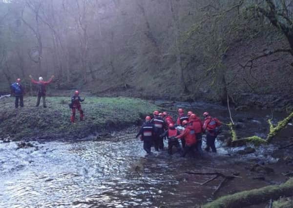 Edale Mountain Rescue Team whisking an injured pensioner to safety.