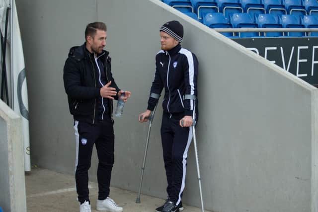 Chesterfield vs Port Vale - Injured pair Angel Martinez and Liam O'Neil - Pic By James Williamson