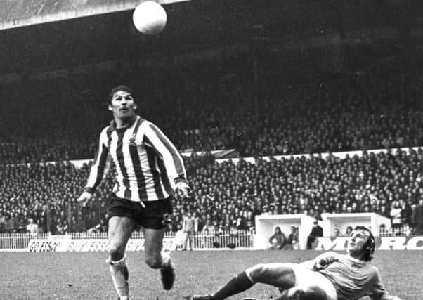 Geoff Salmons in action for Sheffield United against Manchester City