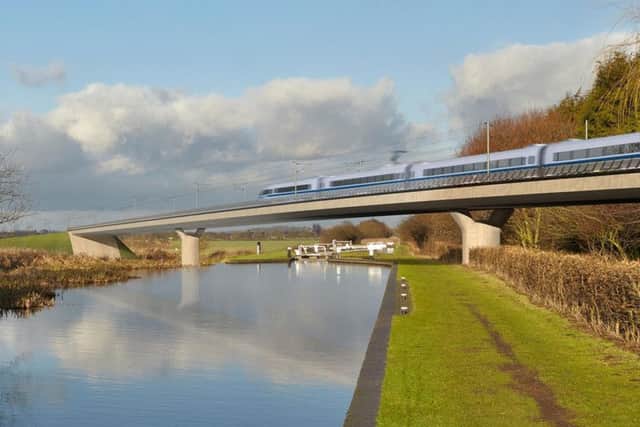 An artists impression of a HS2 train crossing a canal.