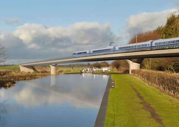 An artists impression of a HS2 train crossing a canal.