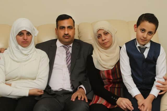 Wael Khalaf and his wife May El Sharfa, daughter Abeer and son Ahmed