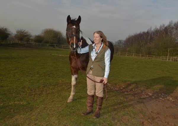 Janice Dixon pictured with Dorothy, horse owner and chairman of Help for Horses charity is concerned at the number of dead horses being dumped in Derbyshire
