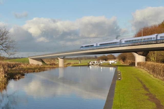 An artist's impression of a HS2 train crossing a canal.