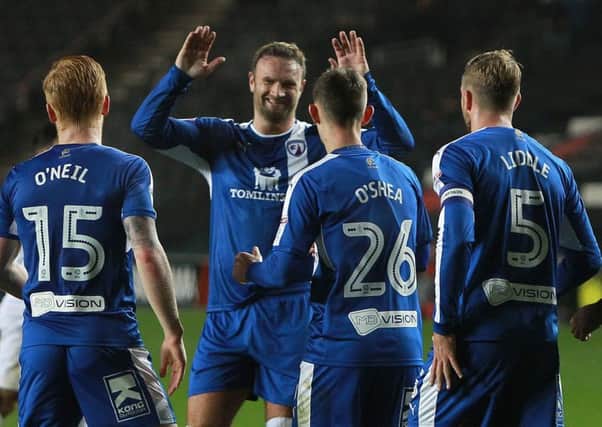 Jay O'Shea celebrates after giving Spirites the lead at MK Dons
