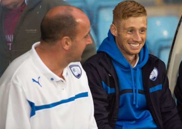 Eoin Doyle shares a laugh with manager Paul Cook during their Chesterfield days