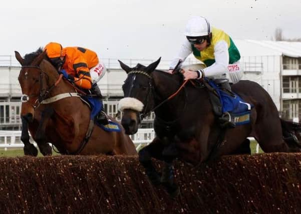 The ill-fated Many Clouds gets the better of Thistlecrack at Cheltenham on Saturday. (PHOTO BY: Julian Herbert PA Wire/PA Images)