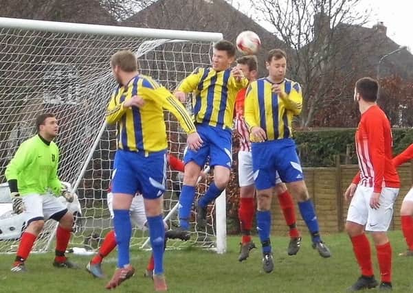 Chesterfield Sunday League Division Three leaders FC Badger (red) were beaten 3-0 at home by title rivals Red Lion Whitt Moor.