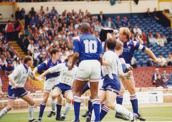 Nicky Law pictured in action during the 1994-5 Wembley final of the fourth-tier play-off between Chesterfield and Bury