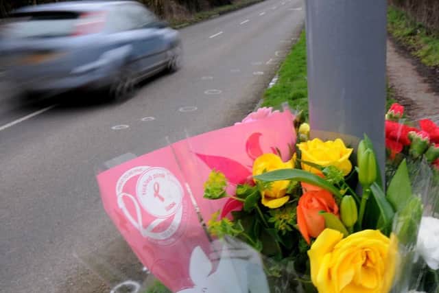 Floral tributes on Fordbridge Lane, South Normanton following the death of a 14 year old boy.