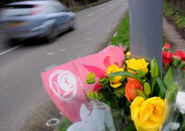 Floral tributes on Fordbridge Lane, South Normanton following the death of a 14 year old boy.