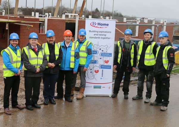Matt Bust, business support manager, Woodhead, Coun John Ritchie, BDC, Peter Campbell, head of housing at BDC, Bob Chadwick Woodhead site manager, David Pearson Woodhead project manager, Josh Gozzard, Tyler Griffiths and Jake Rawson