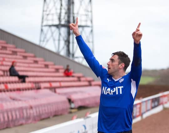 Lee Novak celebrates a Chesterfield goal. - Pic By James Williamson