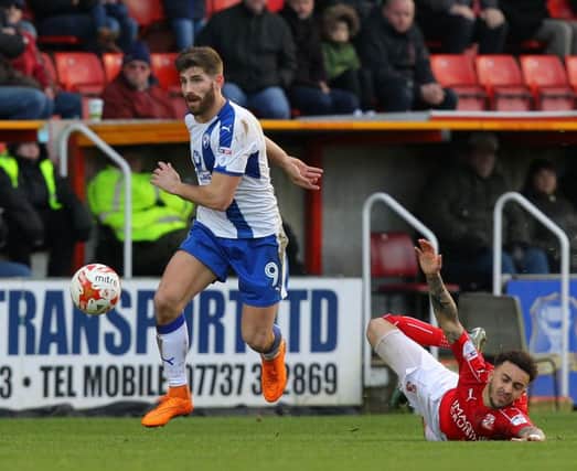 Chesterfield's Ched Evans leaves Swindon's Brandon Ormonde-Ottewille in his wake