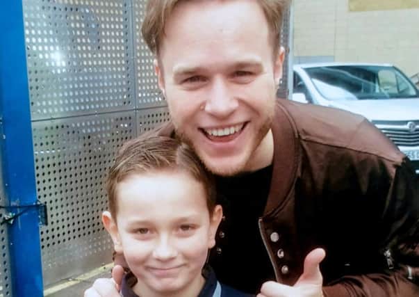 William meets Olly Murs.