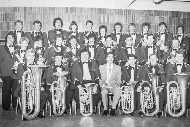 Shirebrook Unison Brass Band member Neil Emson gets an award for 50 years in brass banding. He has played for various bands since 1967 including Gainsborough and the famous Grimesthorpe band. Thoresby band 1988