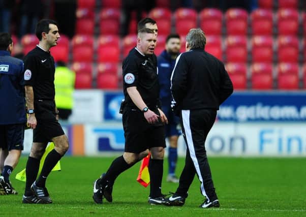 Rotherham United v Birmingham City.
Manager Neil Warnock has words with referee Richard Clark at full time.
13th Febuary 2016.
Picture : Jonathan Gawthorpe