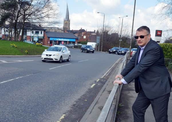 Chesterfield traffic lights demand. Farid Abdi at th road in Chesterfield with dangerous crossing.