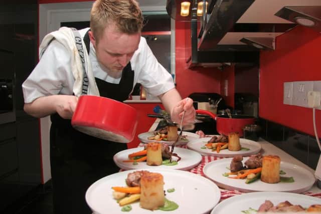 Chef Karl Tyler plates up