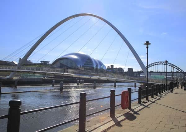 View from the Quayside towards the Gateshead Millennium Bridge, The Sage Gateshead and The Tyne Bridge.