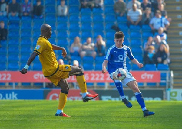Chesterfield's defender Joe Rowley (39) tries to flick it past Port Vale's defender Andrey Bikey (39).  Picture by Stephen Buckley/AHPIX.com. Football, League 1, Chesterfield v Port Vale; 08/04/2017 KO 3.00pm  Proact stadium; copyright picture; Howard Roe; 07973 739229