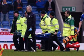 Chesterfield's Ian Evatt is stretchered off the pitch